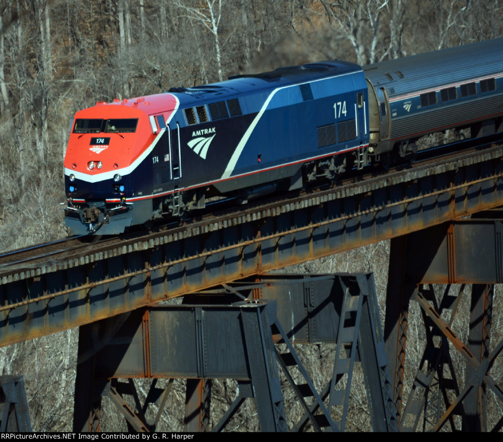 Close up of Phase VII P42 #174 crossing the James River trestle with train 151 in tow
